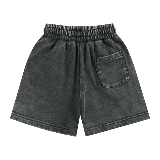 Dark gray/black shorts with a back pocket on a white background