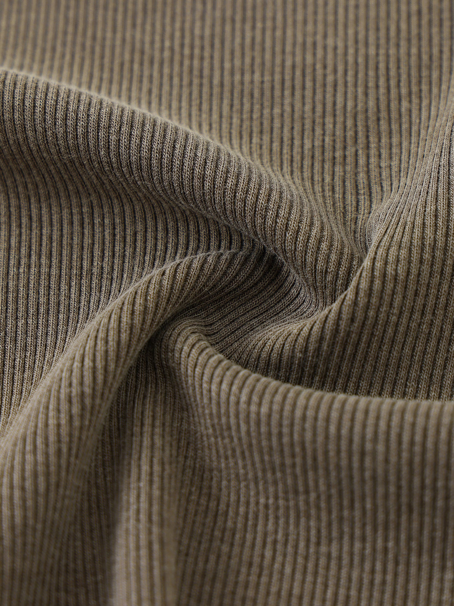 Close-up of brown ribbed fabric texture