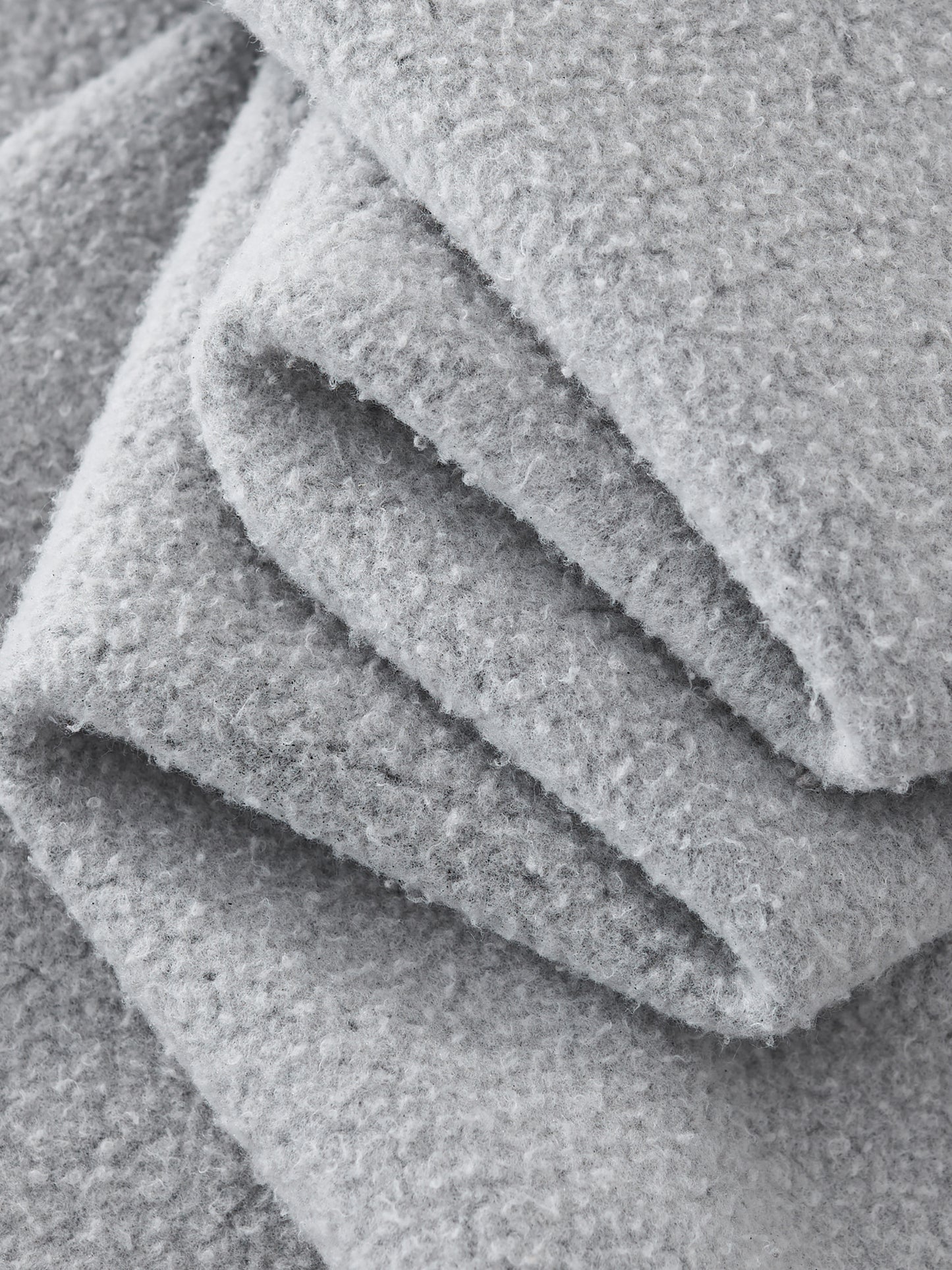 Close-up of folded gray fabric texture