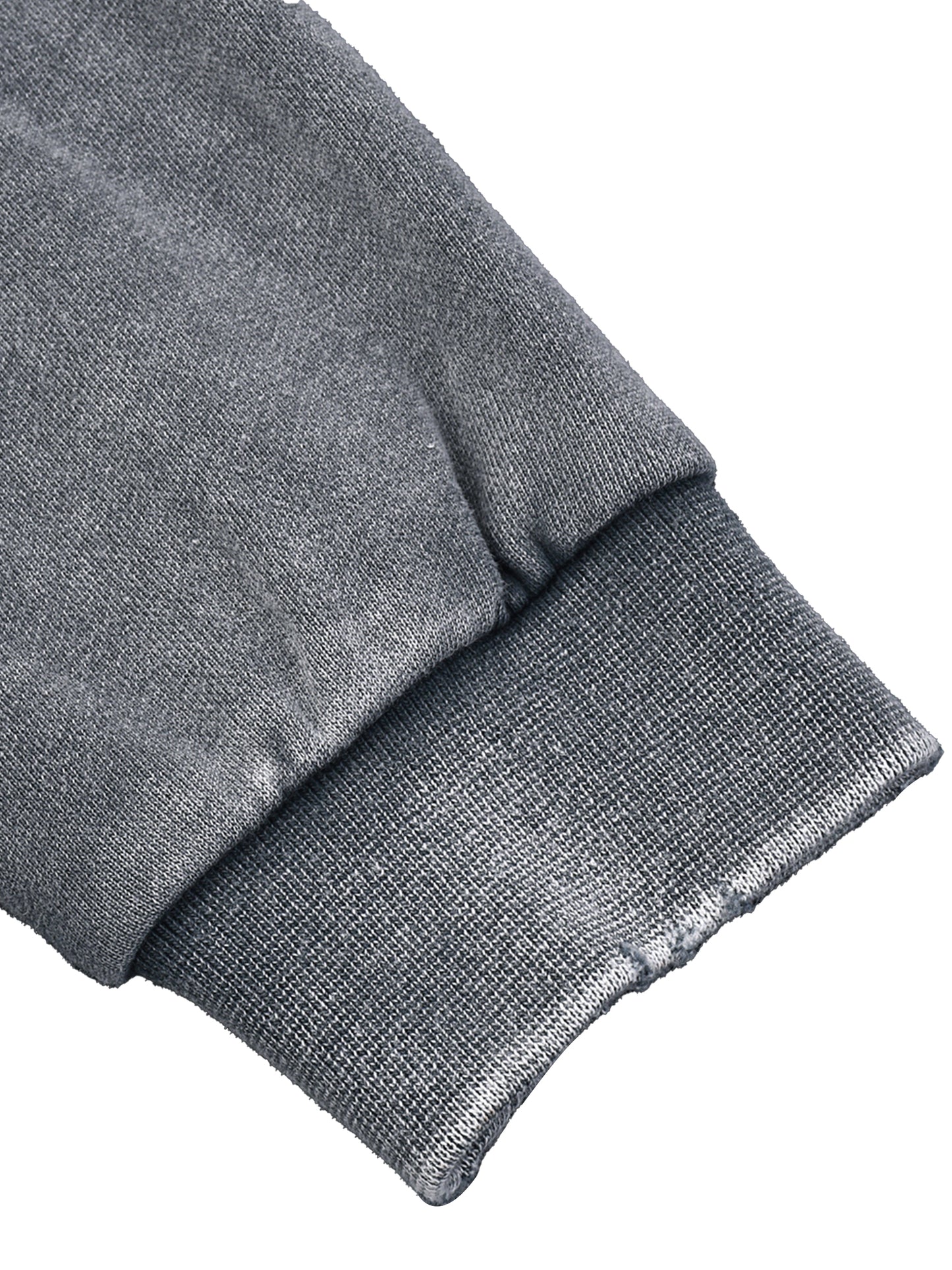 Close-up of a gray knit fabric on a white background