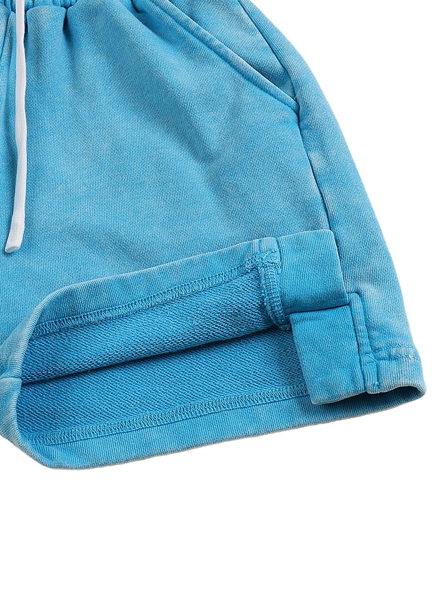 Close-up of blue shorts with a white drawstring on a white background