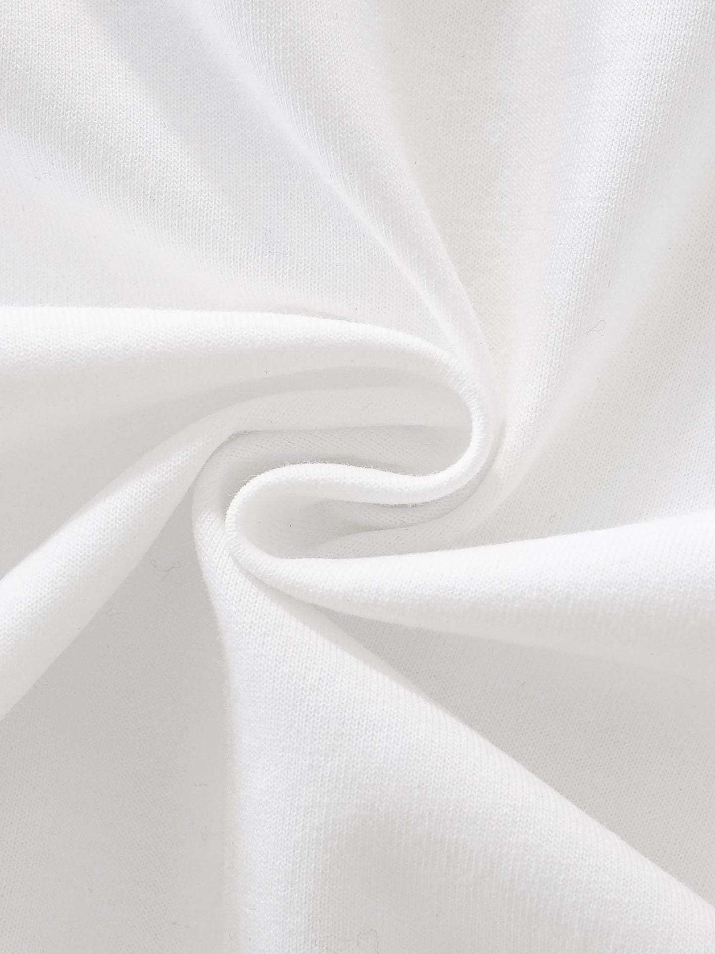 Close-up of white fabric with folds