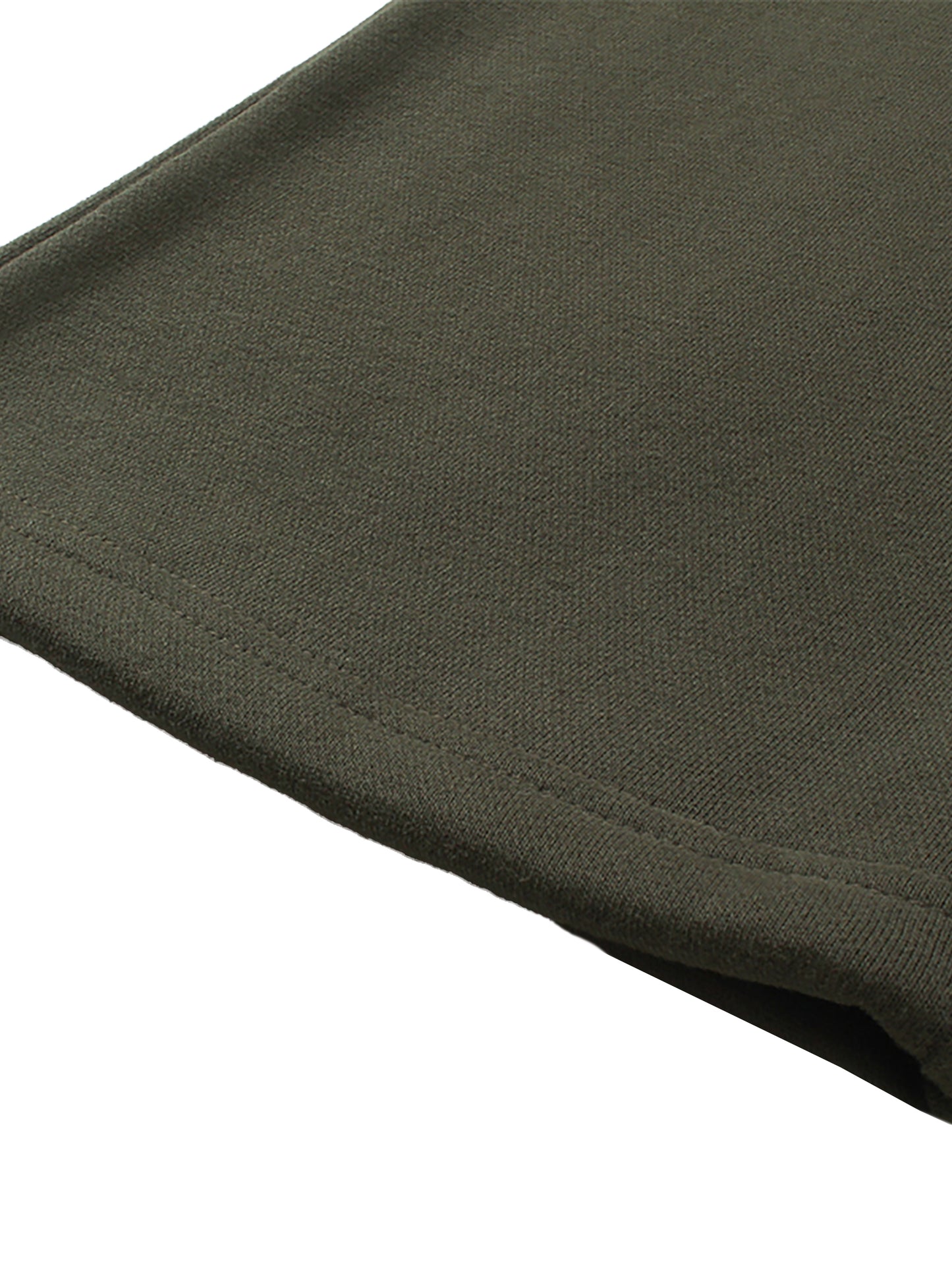 Close-up of a green fabric texture on a white background