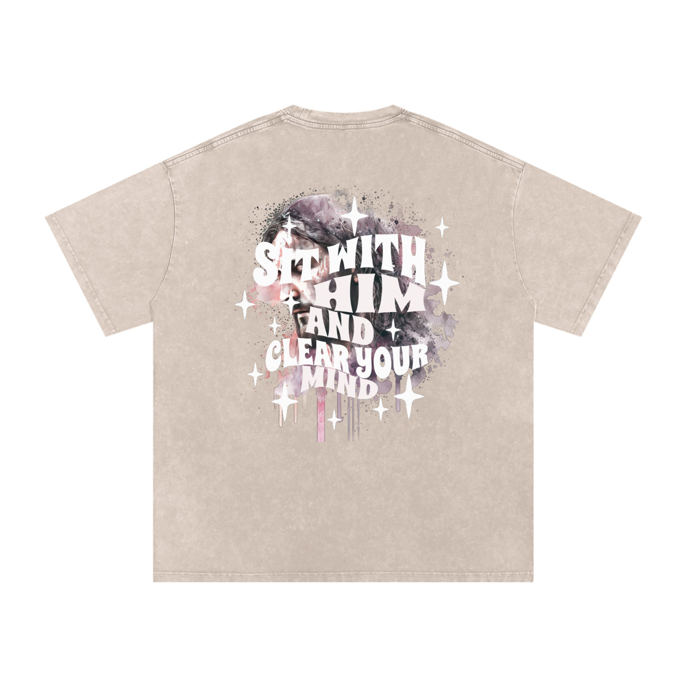 Back of cream t-shirt with 'sit with him and clear your mind' text, and a graphic watercolor of Jesus in the colors pink, gray, black, white, and purple, with white sparkles scattered around the design, in front of a white background.