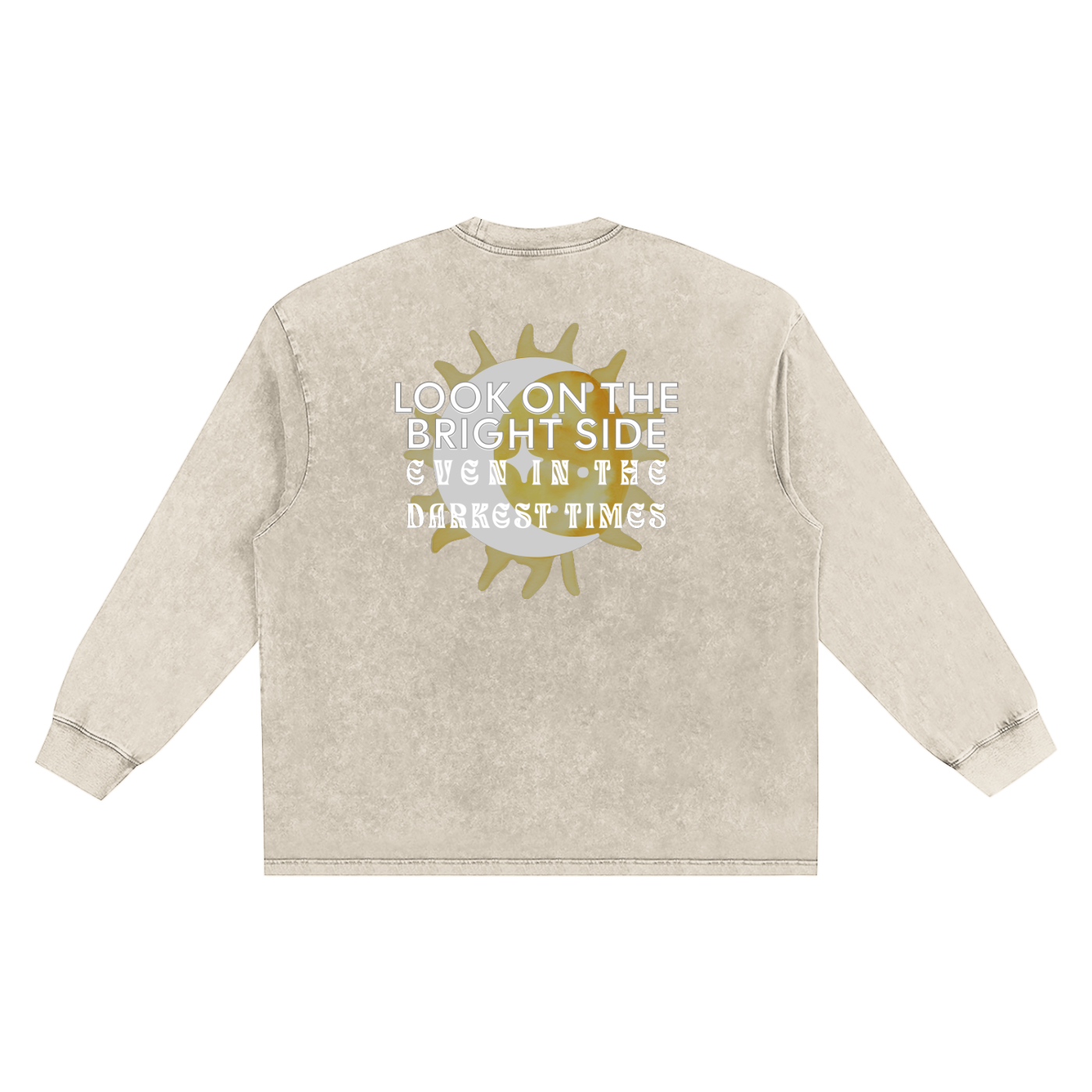 Beige long-sleeve shirt with motivational quote and sun and moon graphic in front of a white background. Text says "Look on the bright side even in the darkest times"