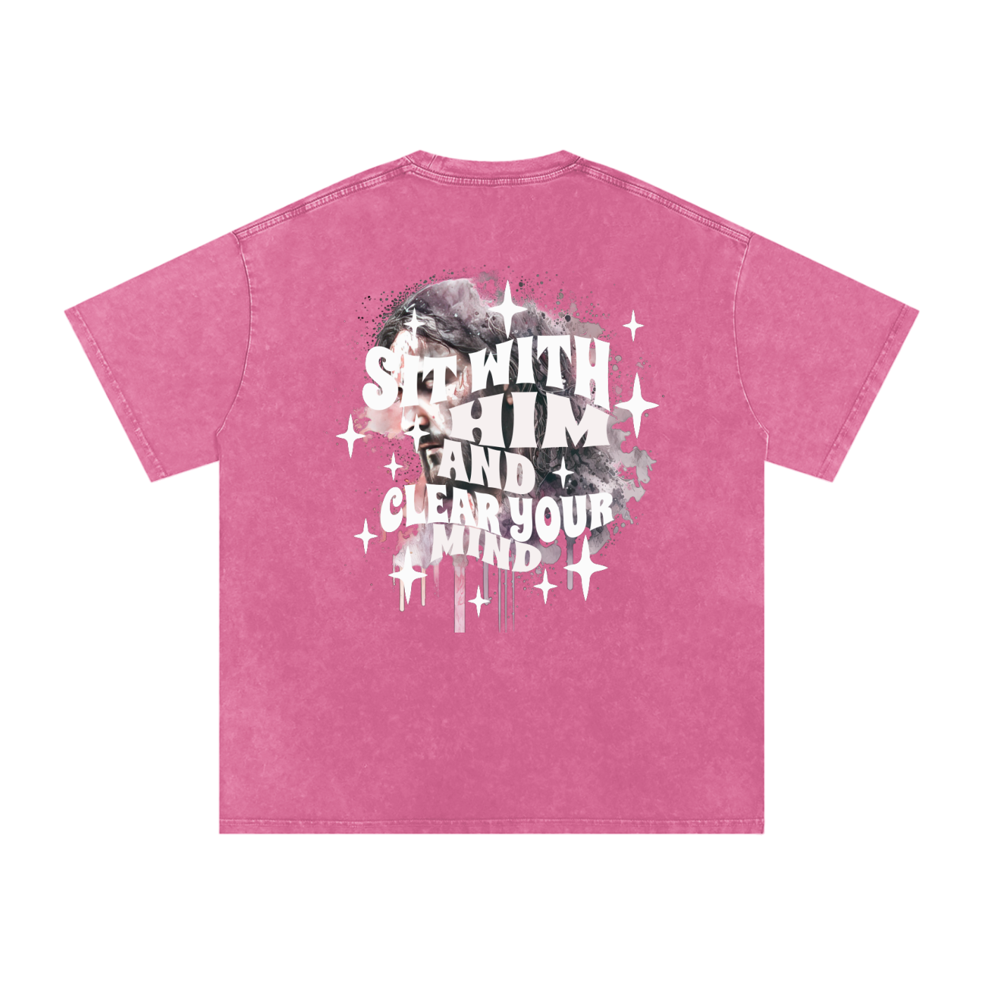 Back of pink t-shirt with 'sit with him and clear your mind' text, and a graphic watercolor of Jesus in the colors pink, gray, black, white, and purple, with white sparkles scattered around the design, in front of a white background.