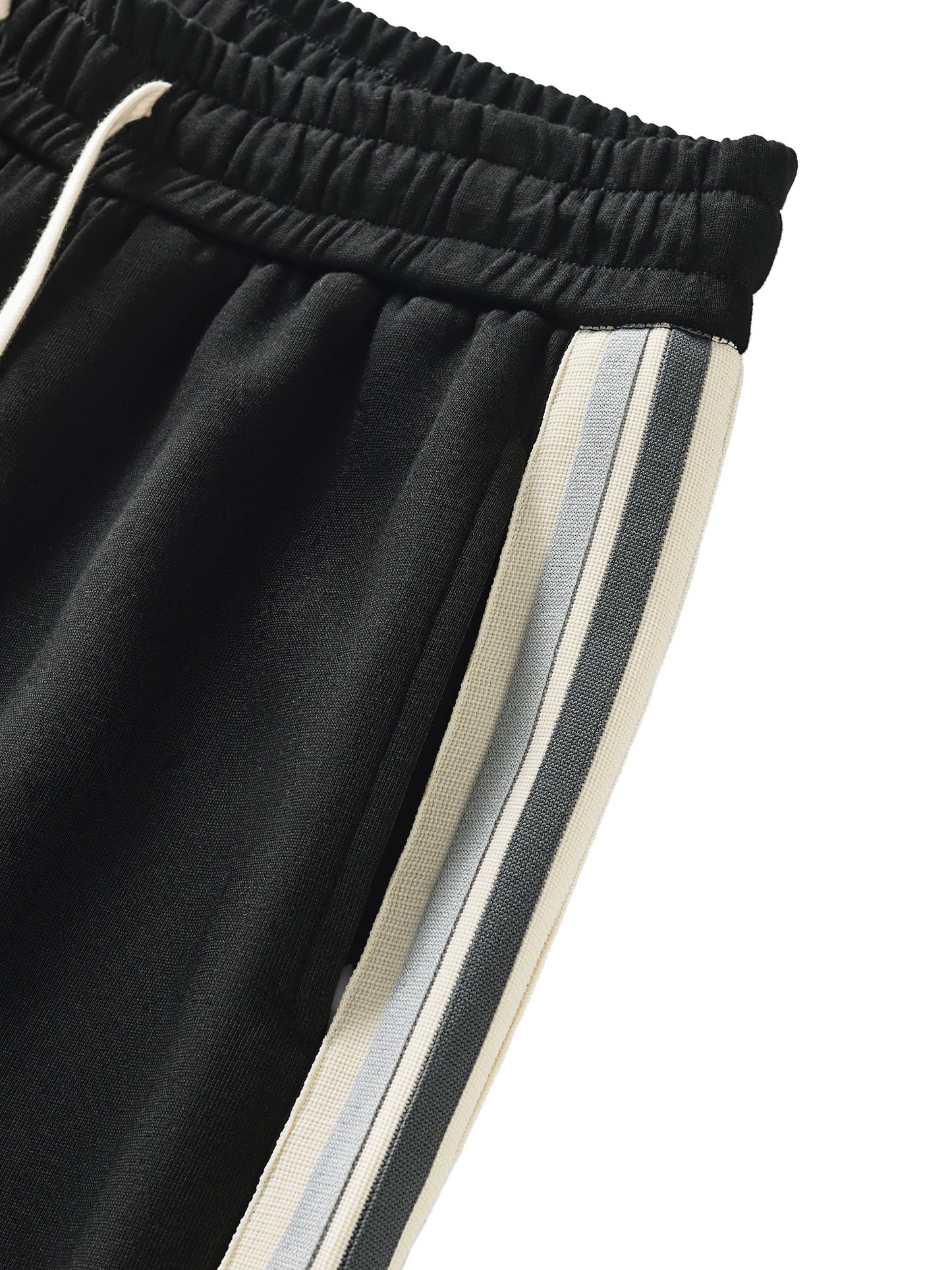 Black pants with white and gray stripes on a white background