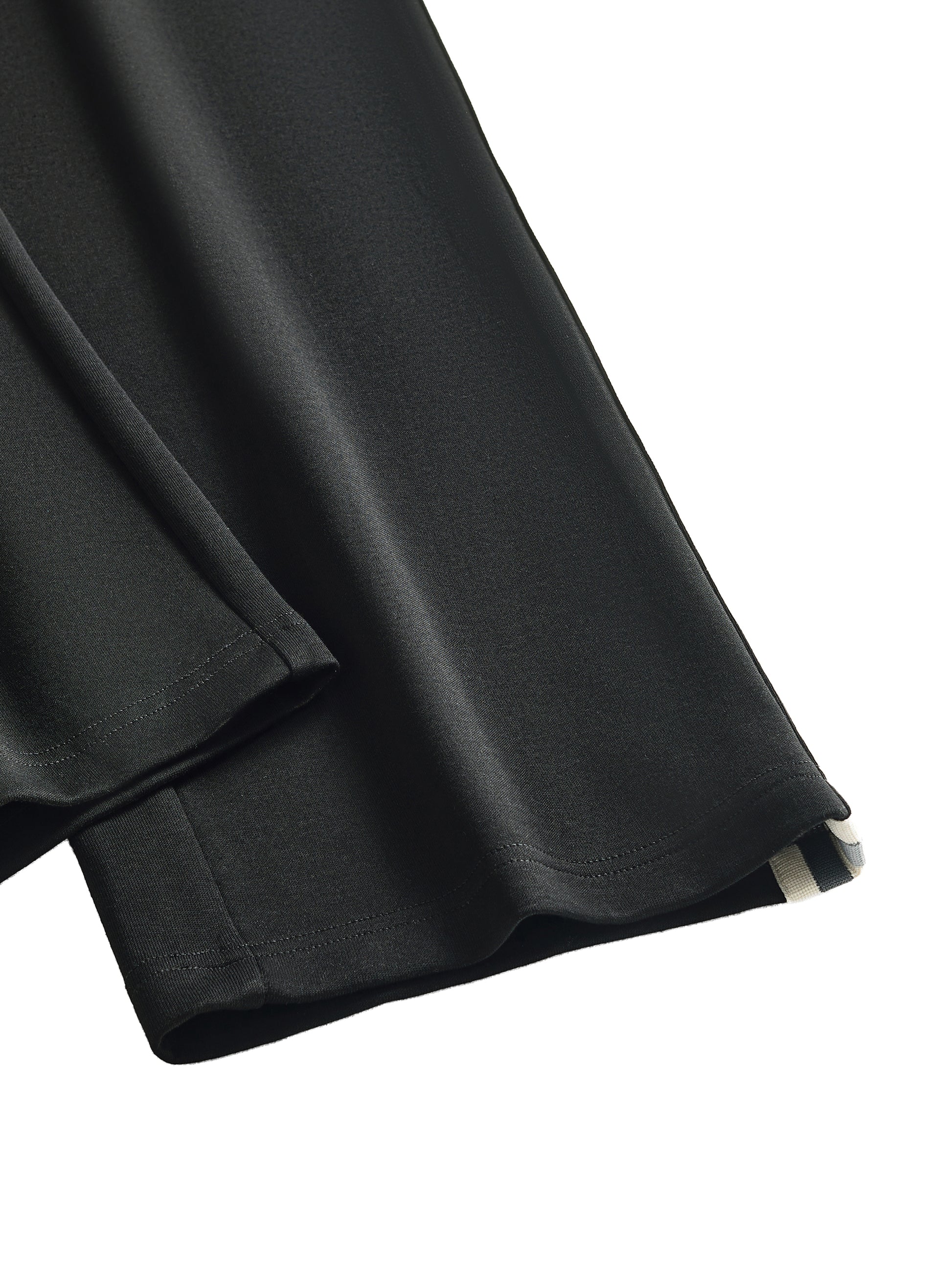 Black fabric with a slight texture on a white background