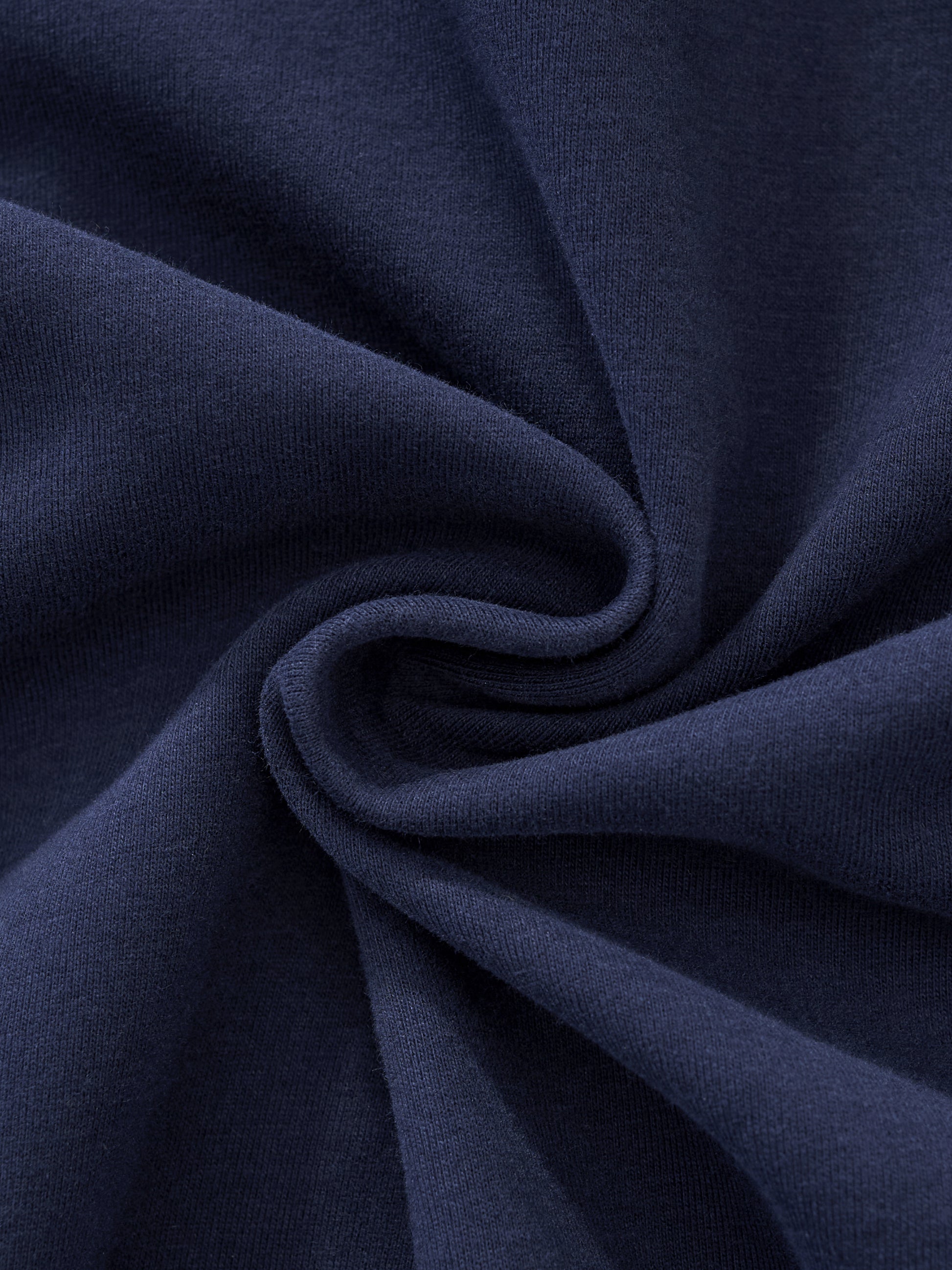 Close-up of dark blue fabric with folds