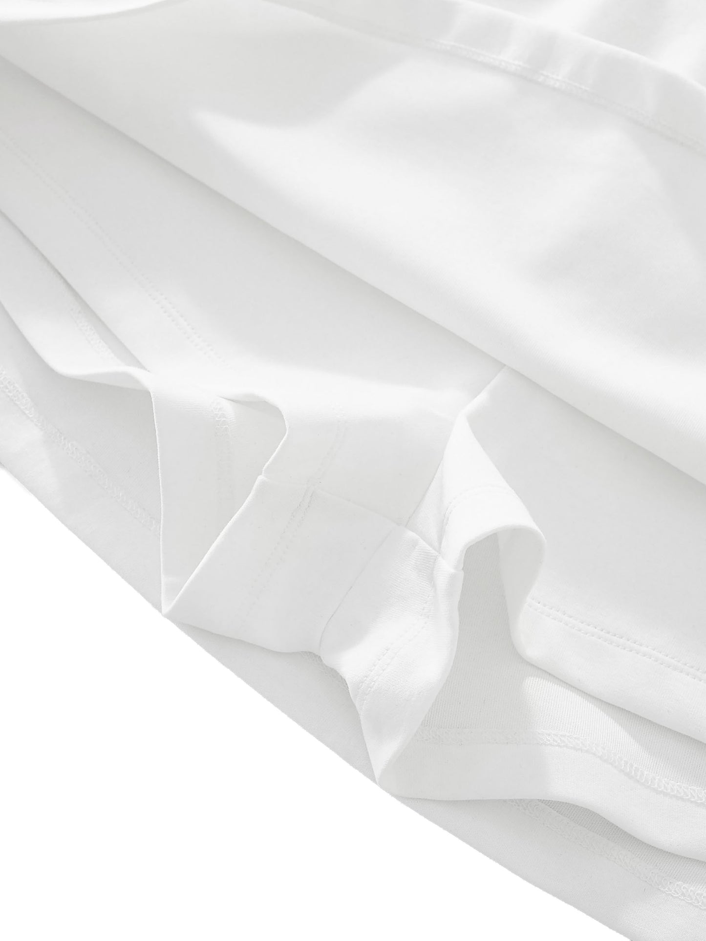 Close-up of white fabric with folds on a white background
