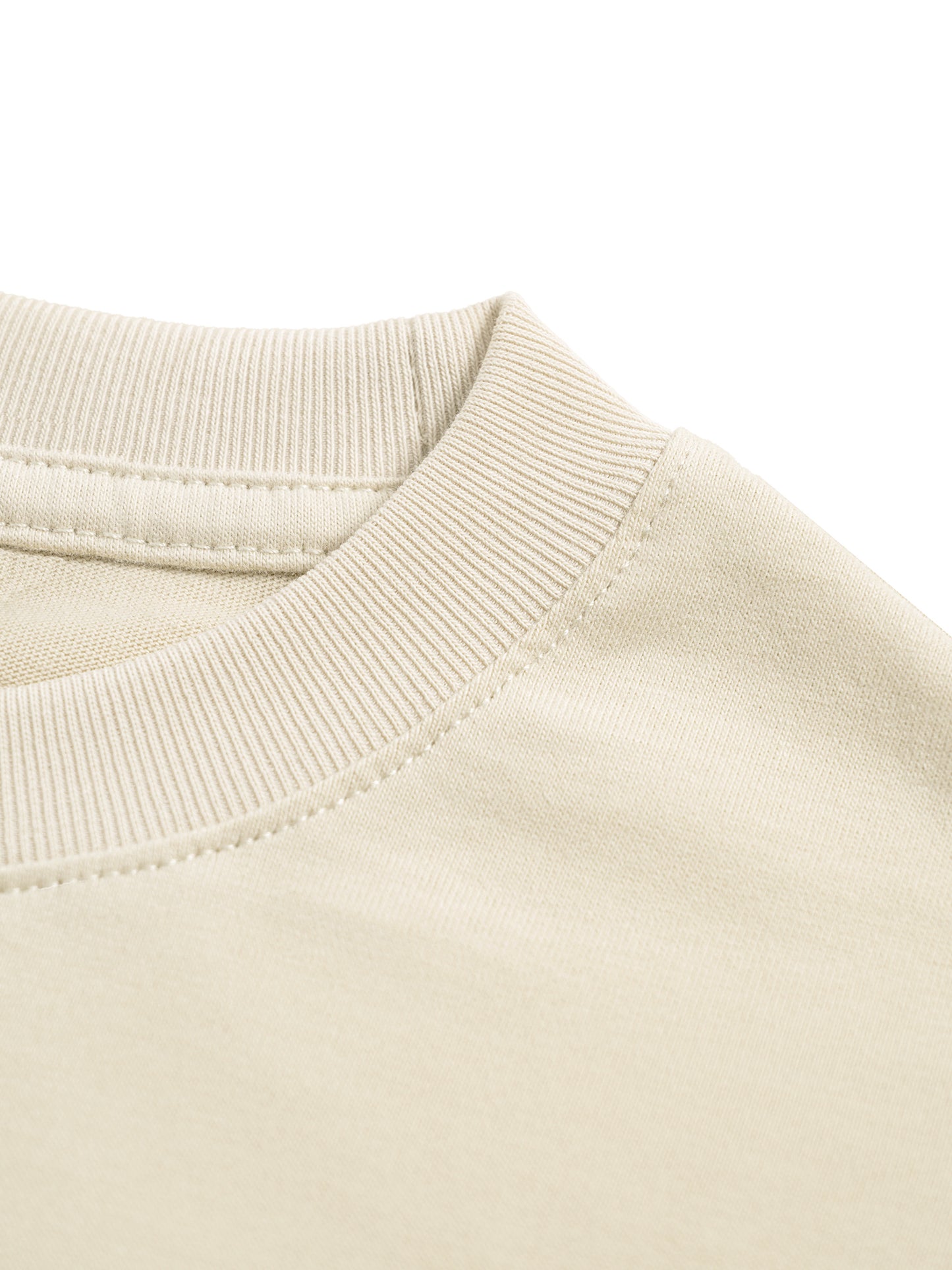 Close-up of a beige long sleeve collar on a white background