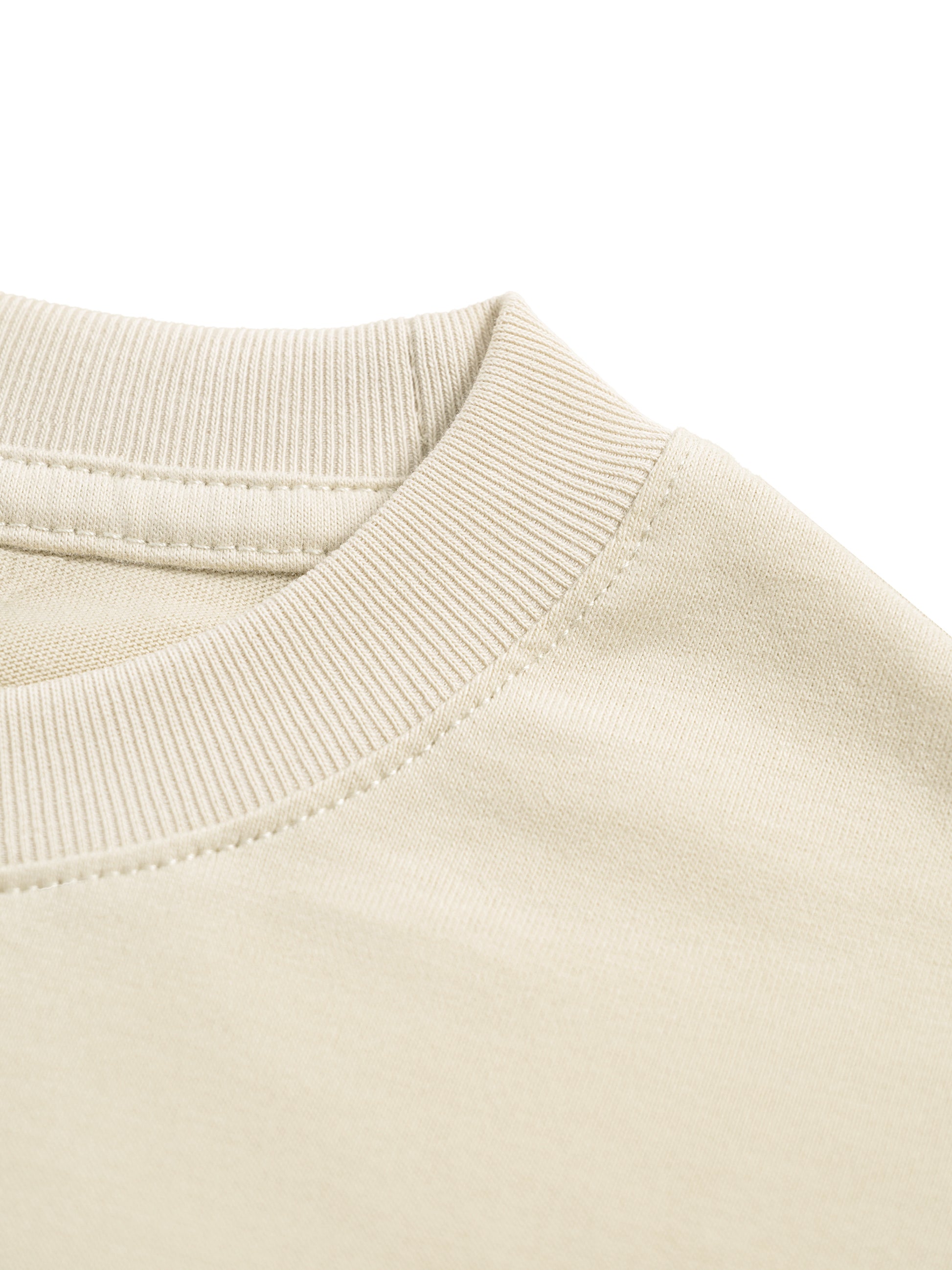 Close-up of a beige long sleeve collar on a white background