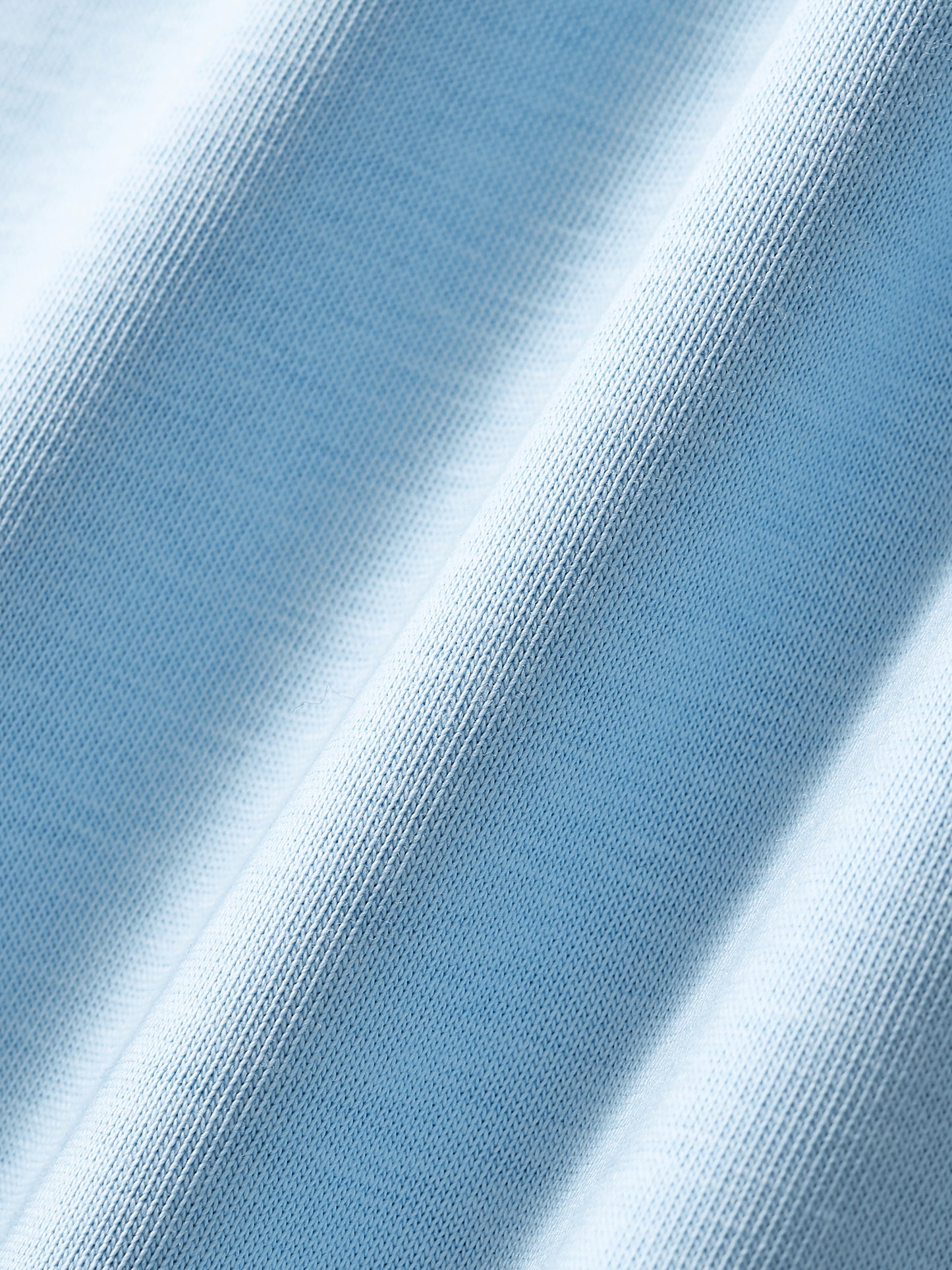 Close-up of blue fabric with a textured pattern