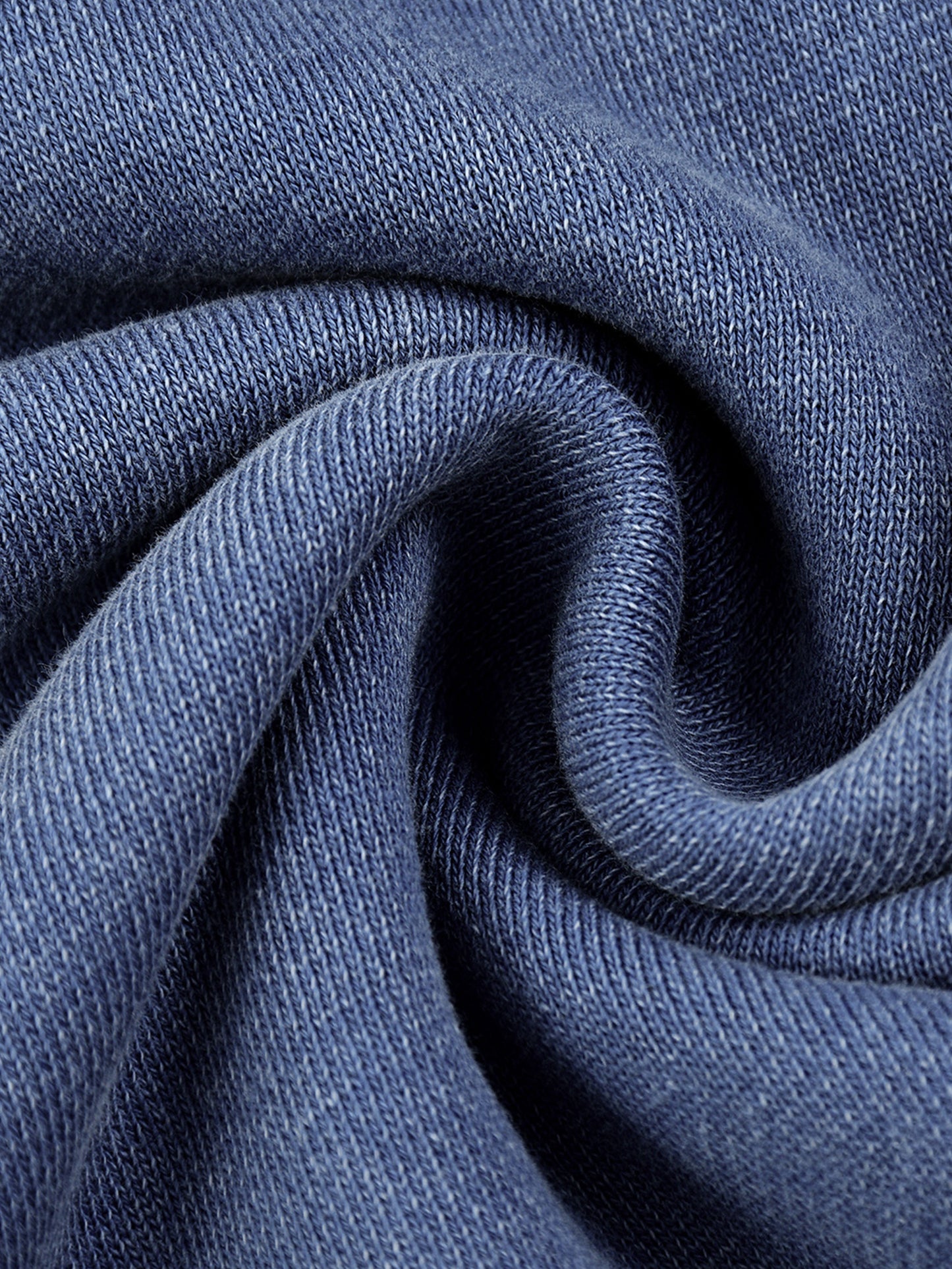 Close-up of blue fabric with a textured pattern