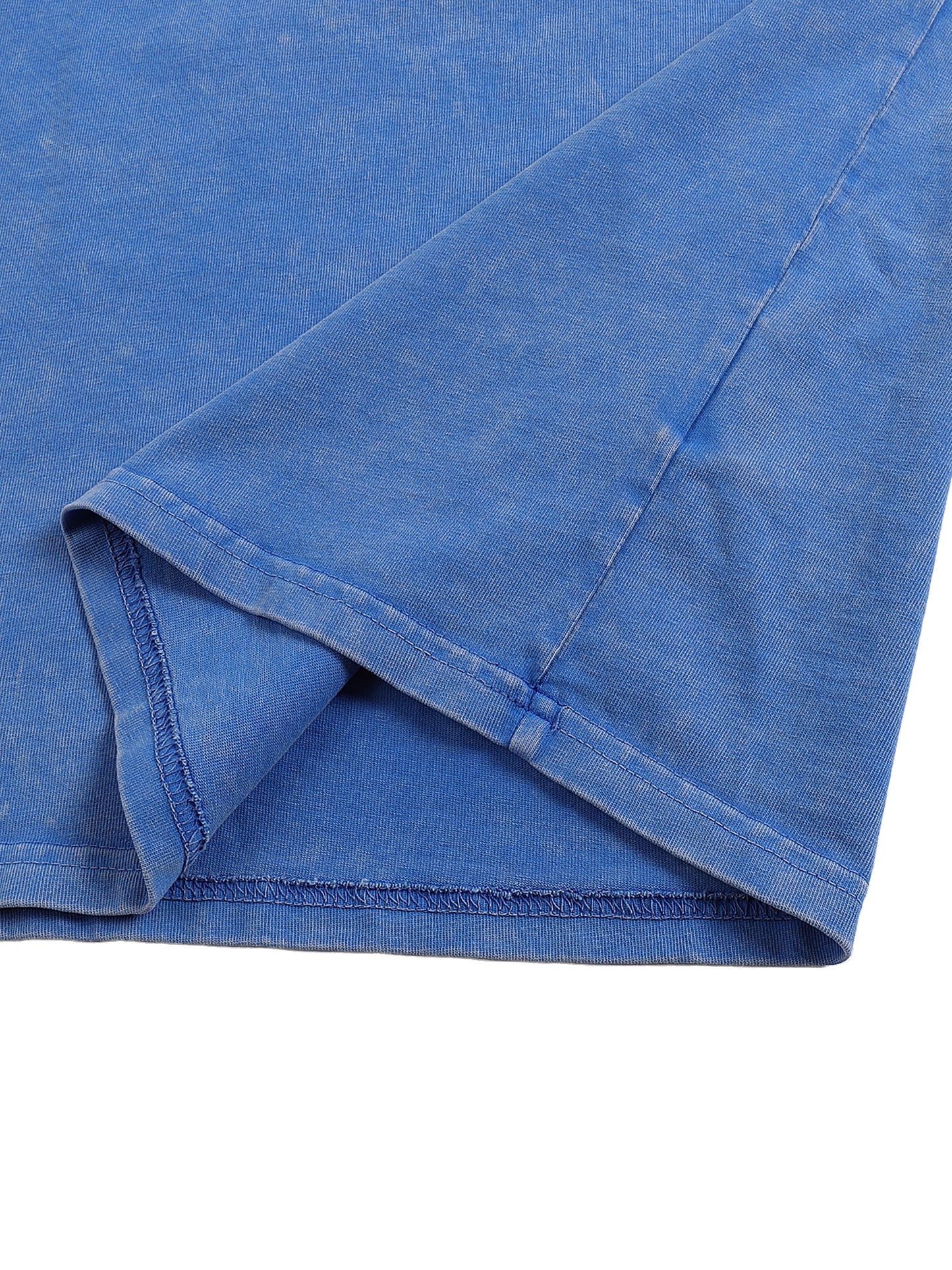 Close-up of a blue fabric with a slight texture on a white background