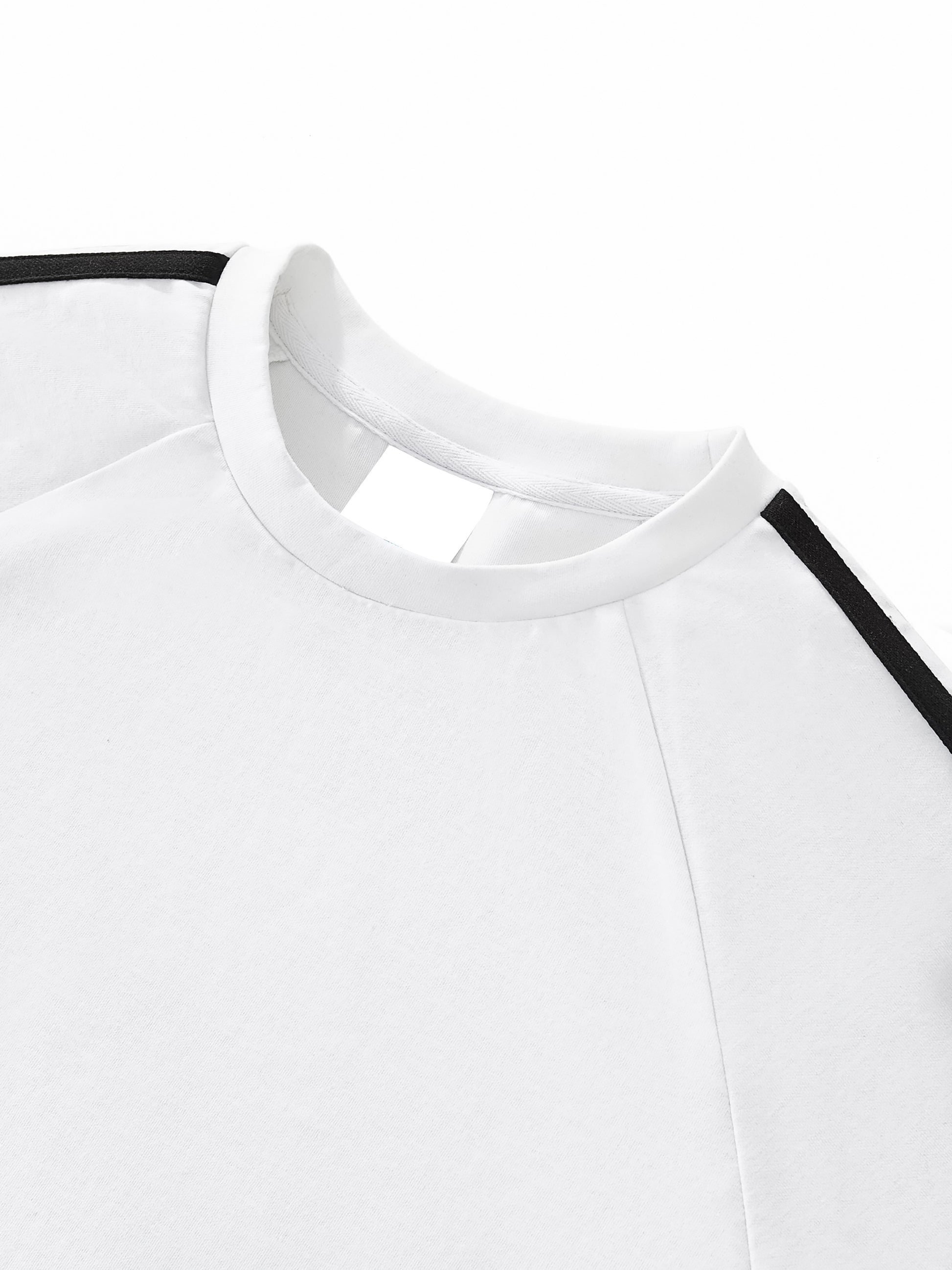 Close-up of a white shirt with black trim on a white background