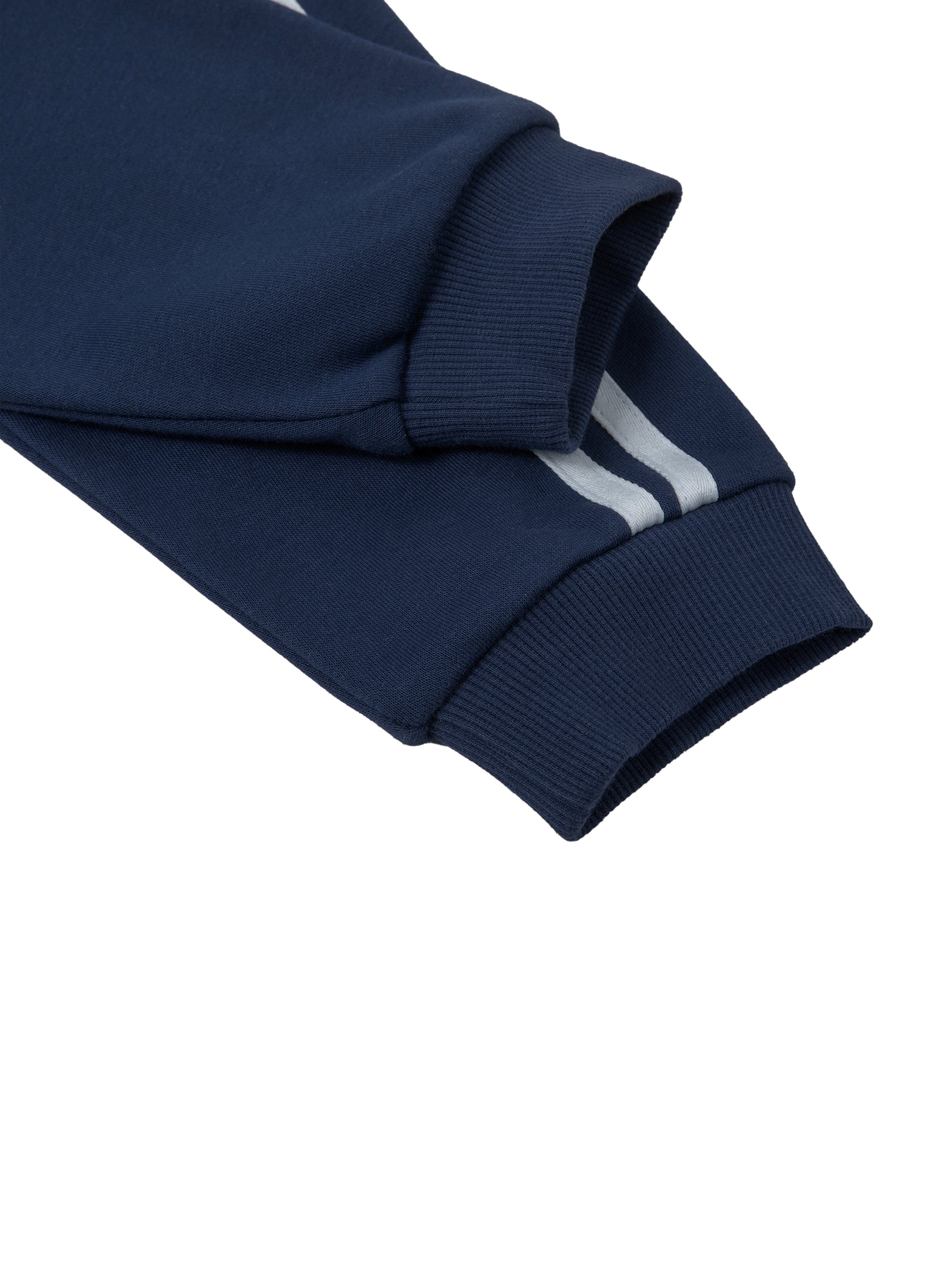 Close up of Navy blue hoodie sleeves with white stripes on a white background