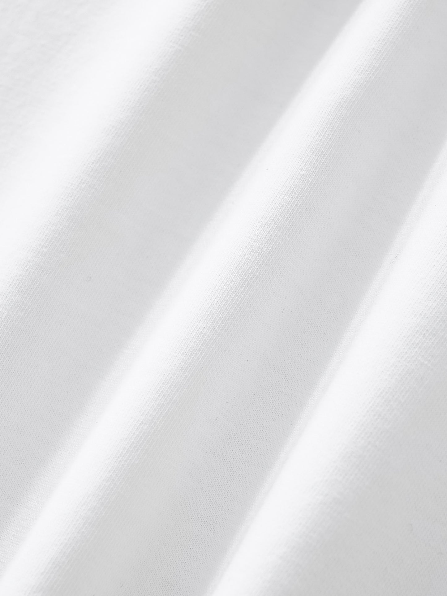 Close-up of white fabric with folds