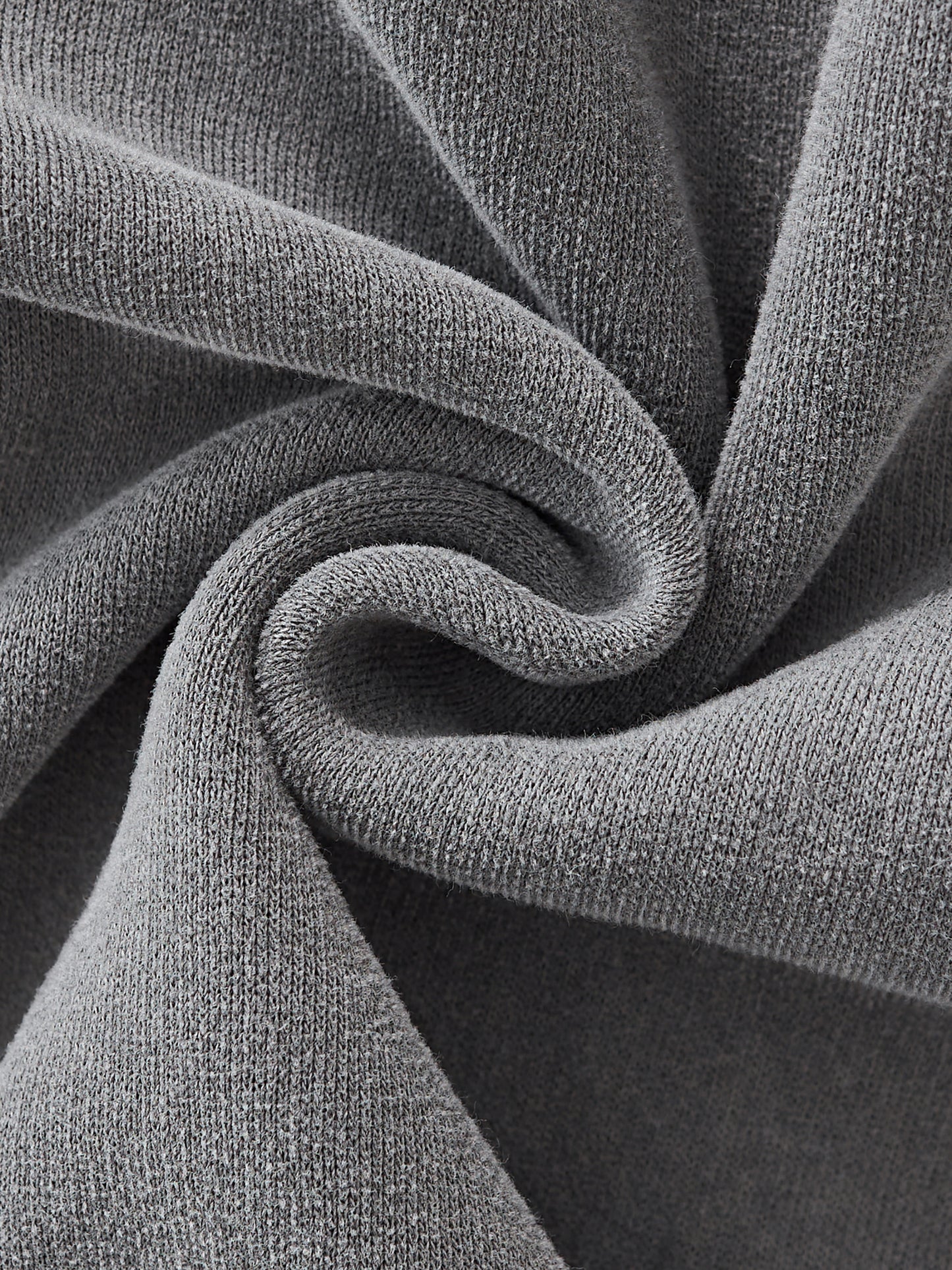 Close-up of gray fabric with a textured pattern