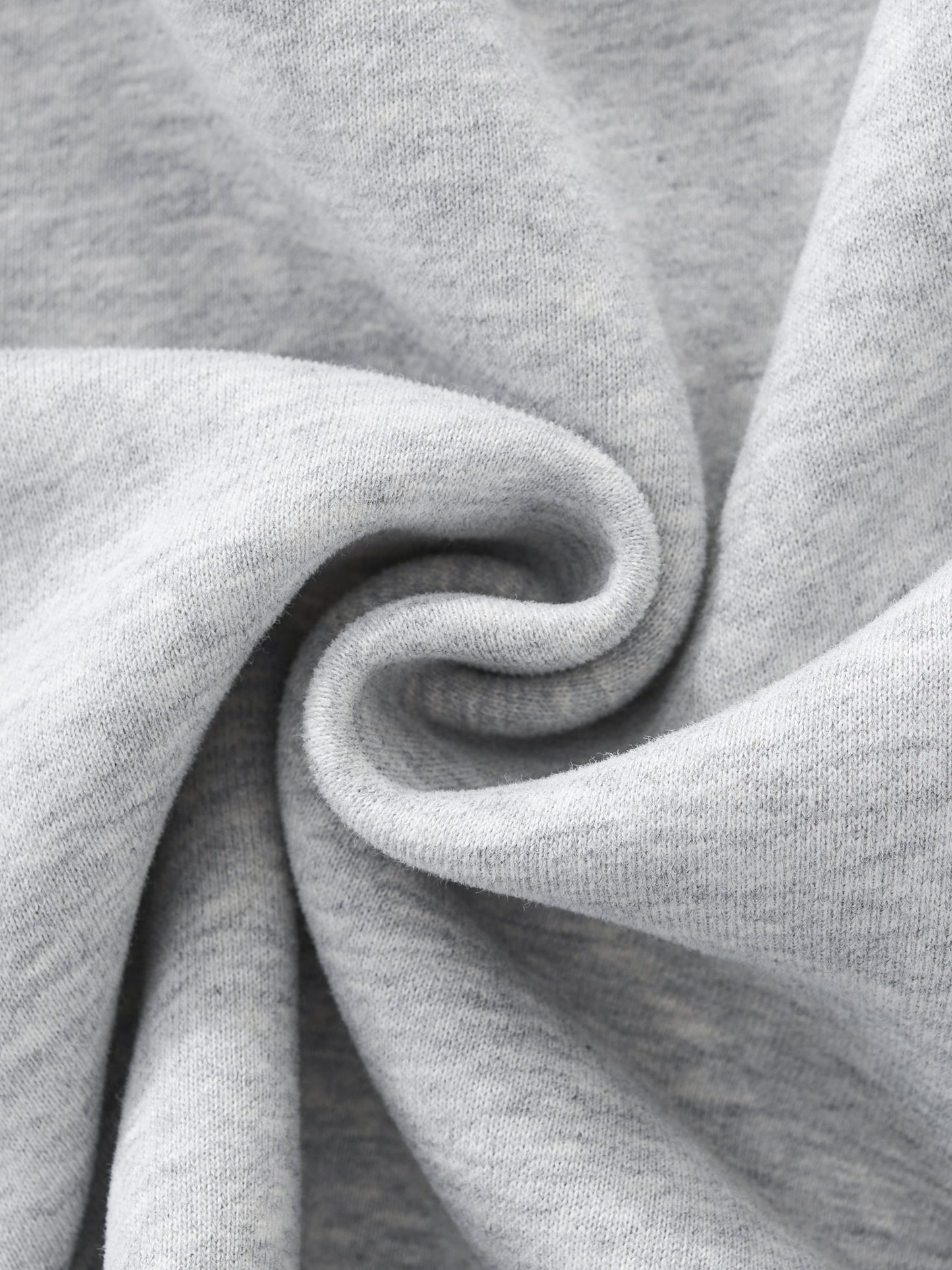 Close-up of gray fabric with a swirl pattern