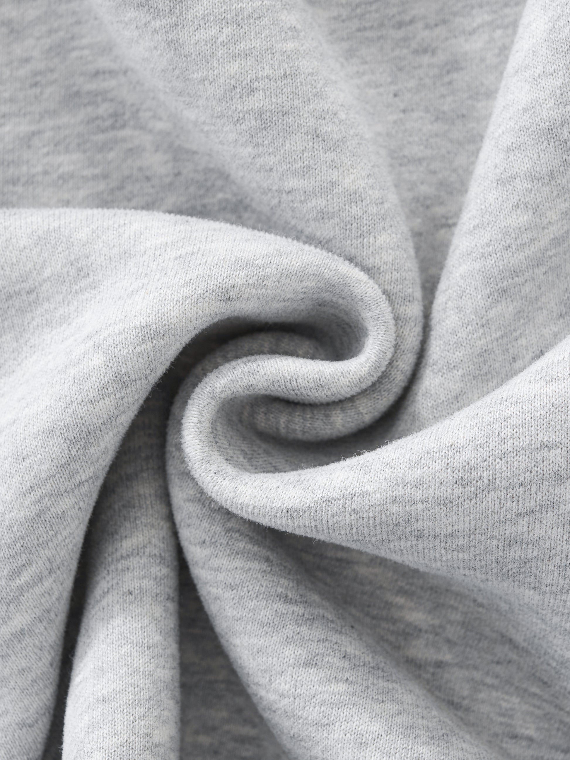 Close-up of gray fabric with a swirl pattern