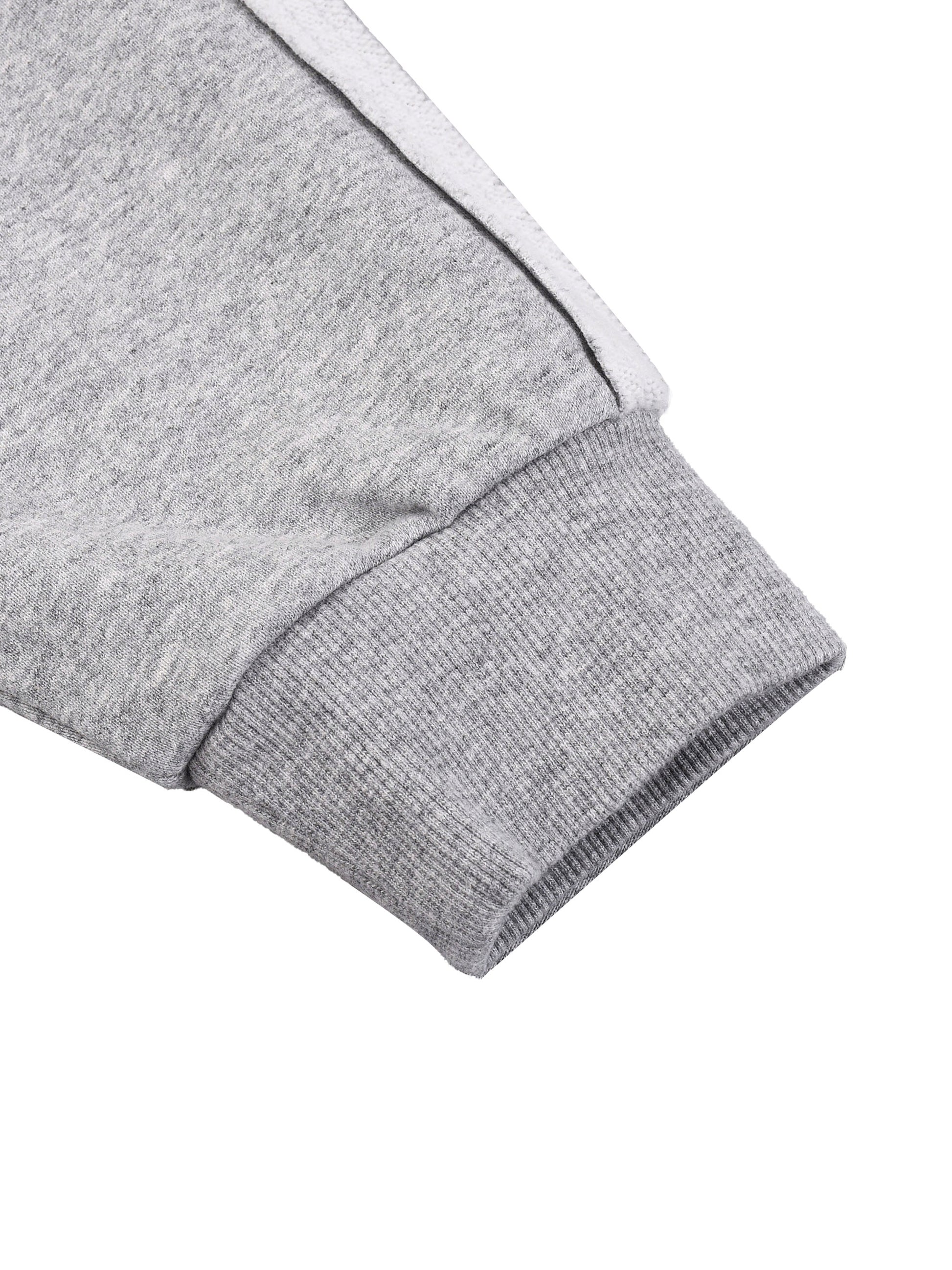 Close-up of gray sleeve on zip up hoodie with white stripes on a white background