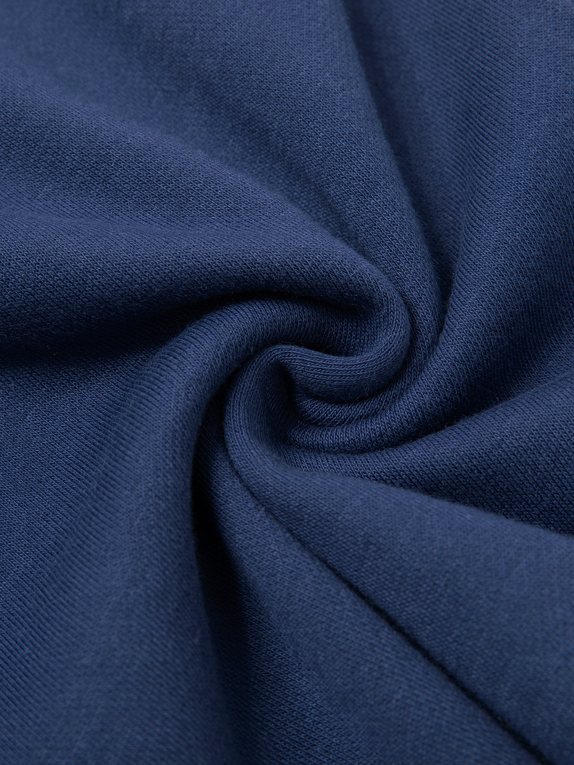 Close-up of dark blue fabric with folds