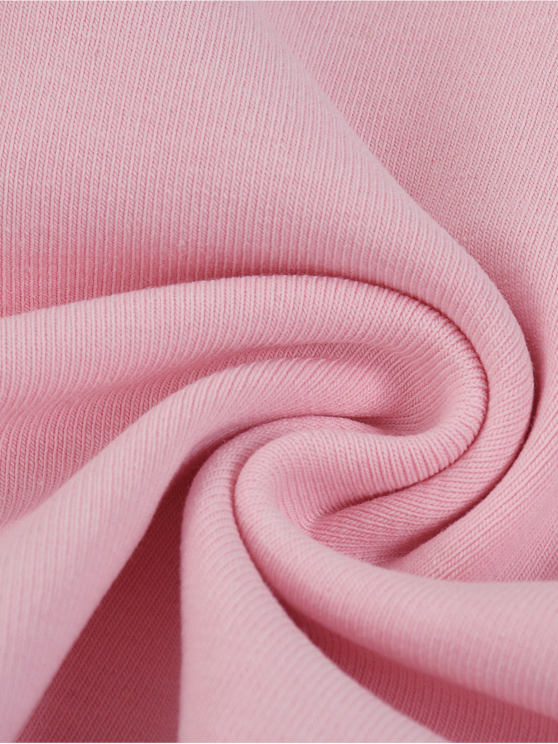 Close-up of pink fabric with a swirl pattern