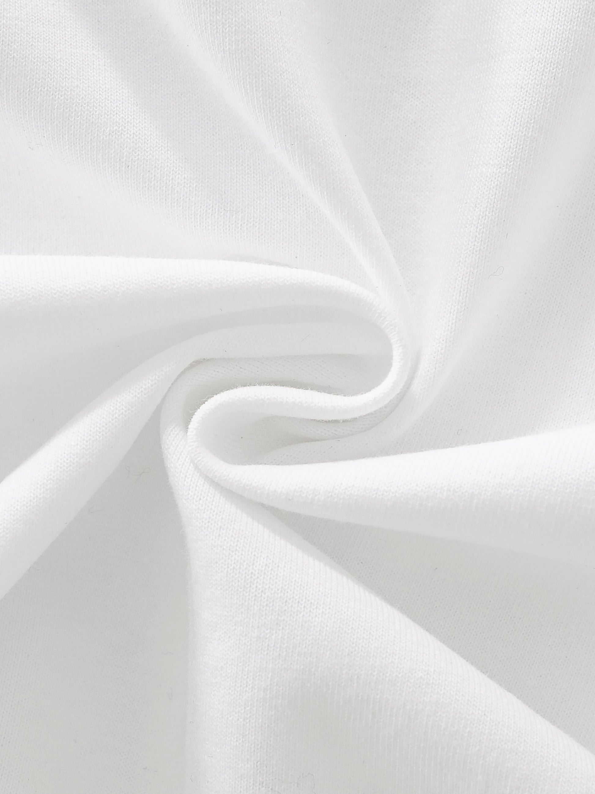 Close-up of white fabric with folds