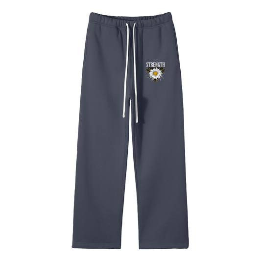 Dark gray sweatpants with a white flower and 'Strength' text on a white background