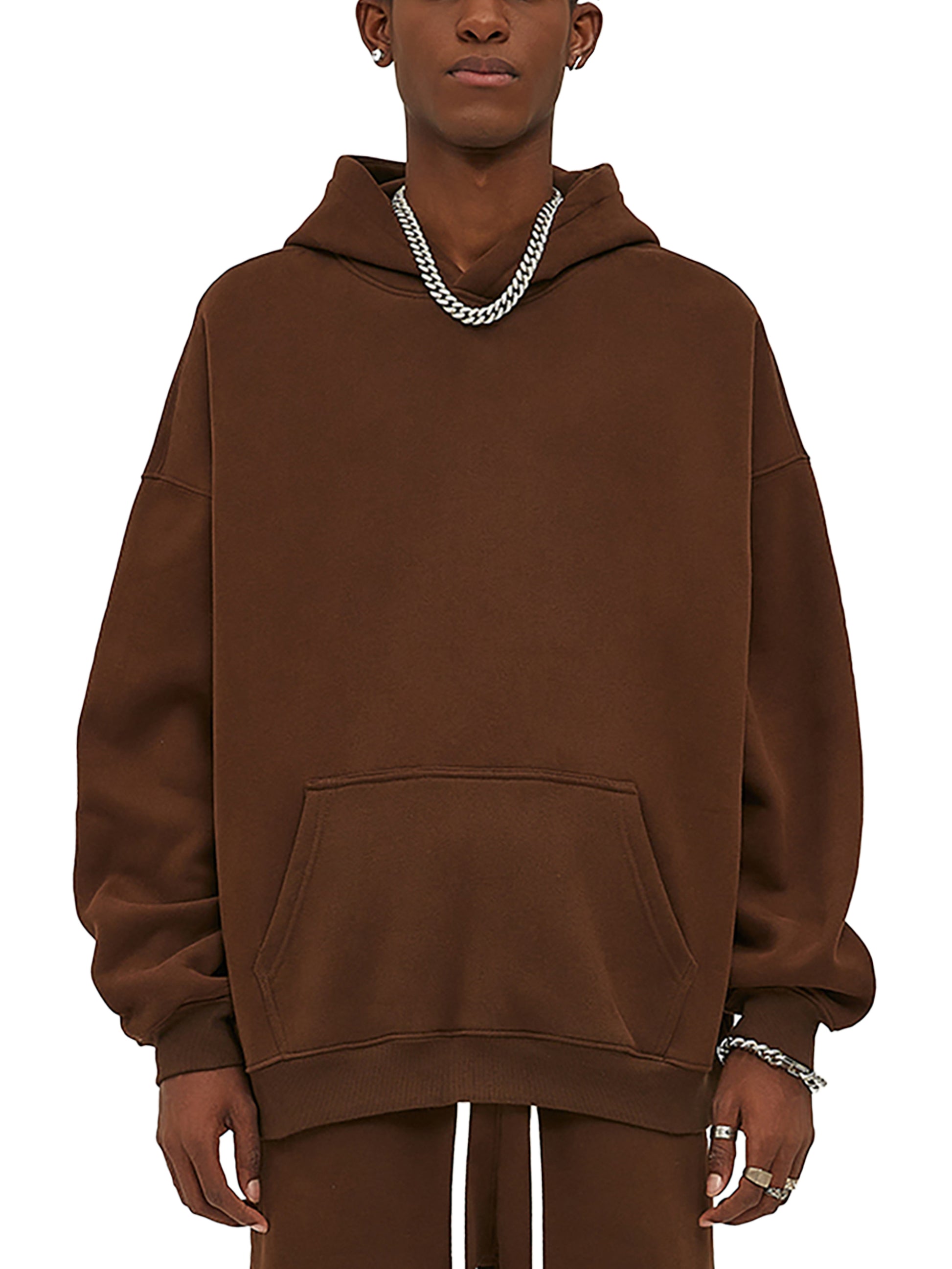 Front of a brown hoodie mockup on a male model. 
