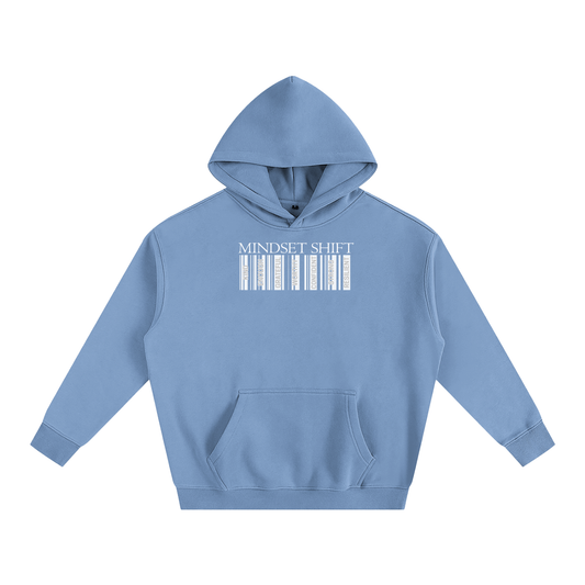 Light Blue hoodie with barcode design and 'MINDSET SHIFT' text on a white background, Small lettering in barcode formation. Lettering Specified: Kind, Enough, Grateful, Worthy, Confident, Strong, Resilient