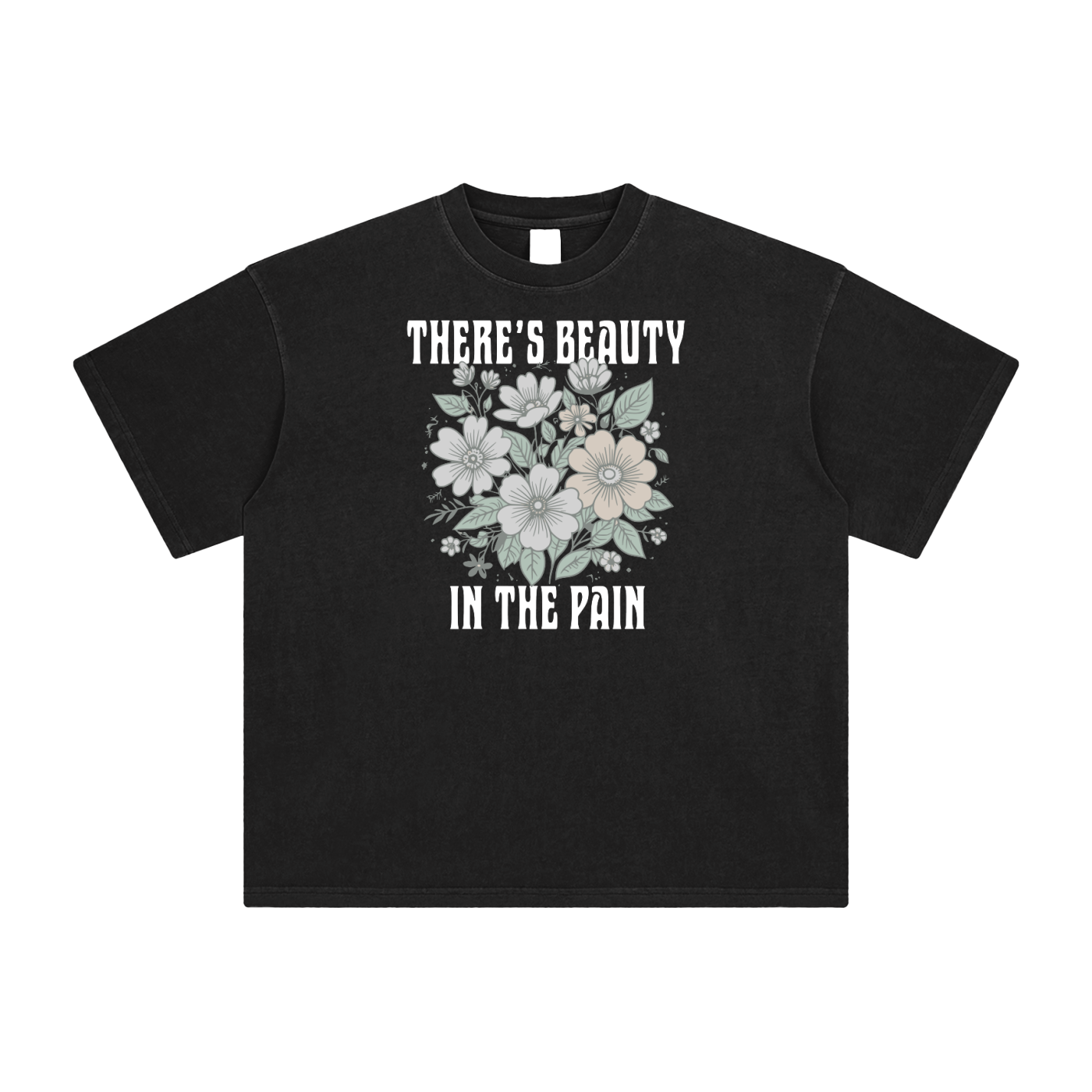 Black t-shirt with floral design and text on a white background. Text: "There's Beauty In The Pain".