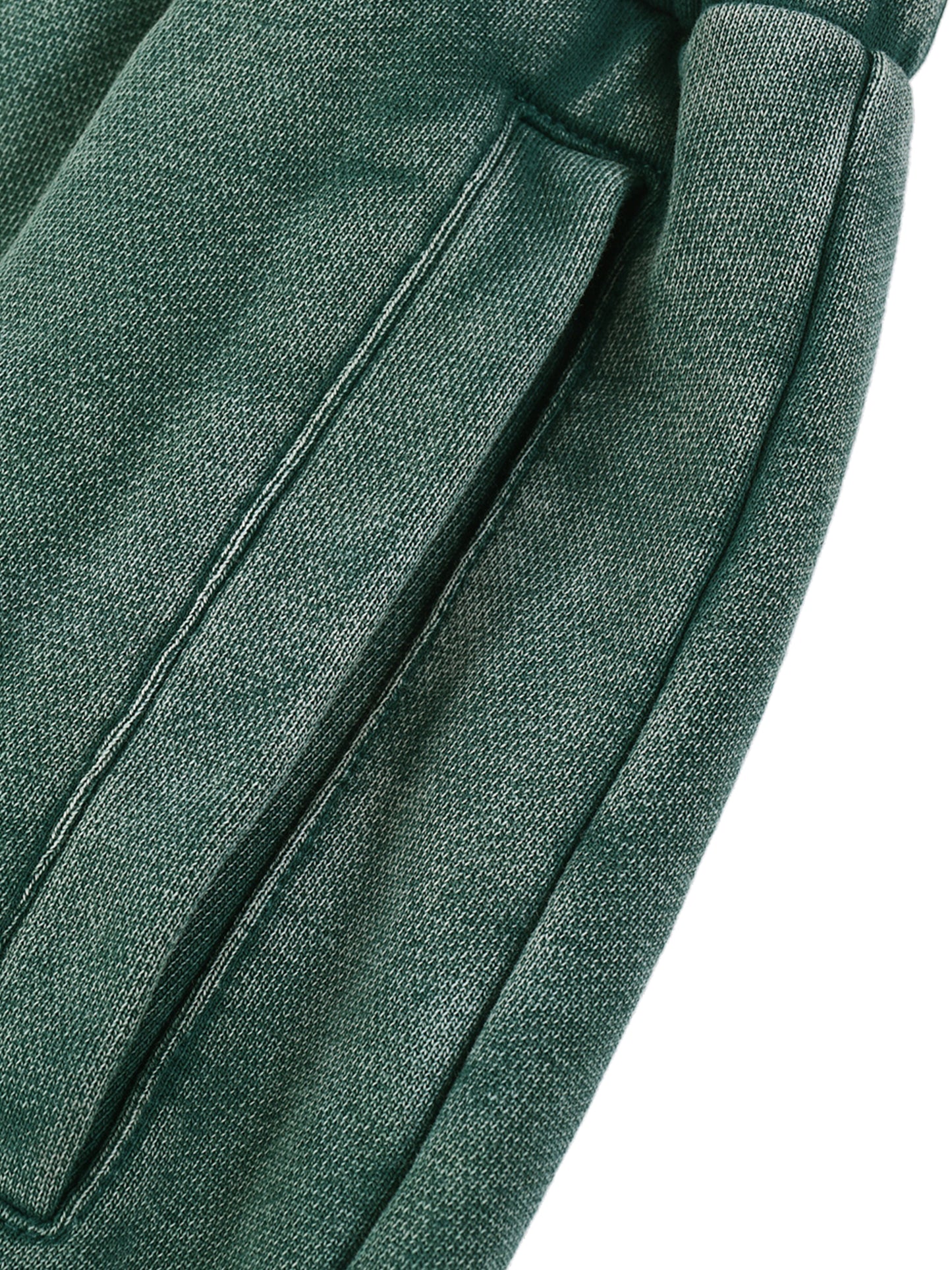 Close-up of green fabric with a white background