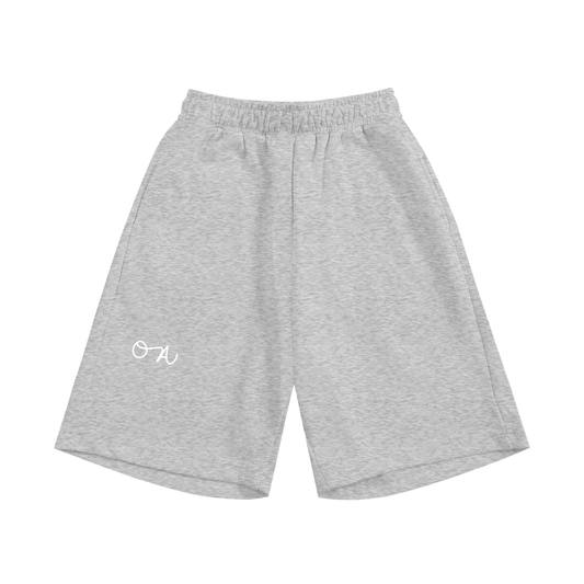 Gray shorts with a white logo on a white background