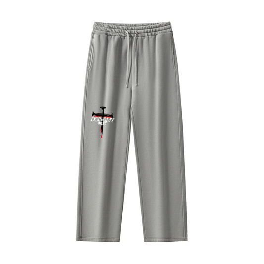 Light Gray sweatpants with a cross design and 'doing my best' text in front of a white background.
