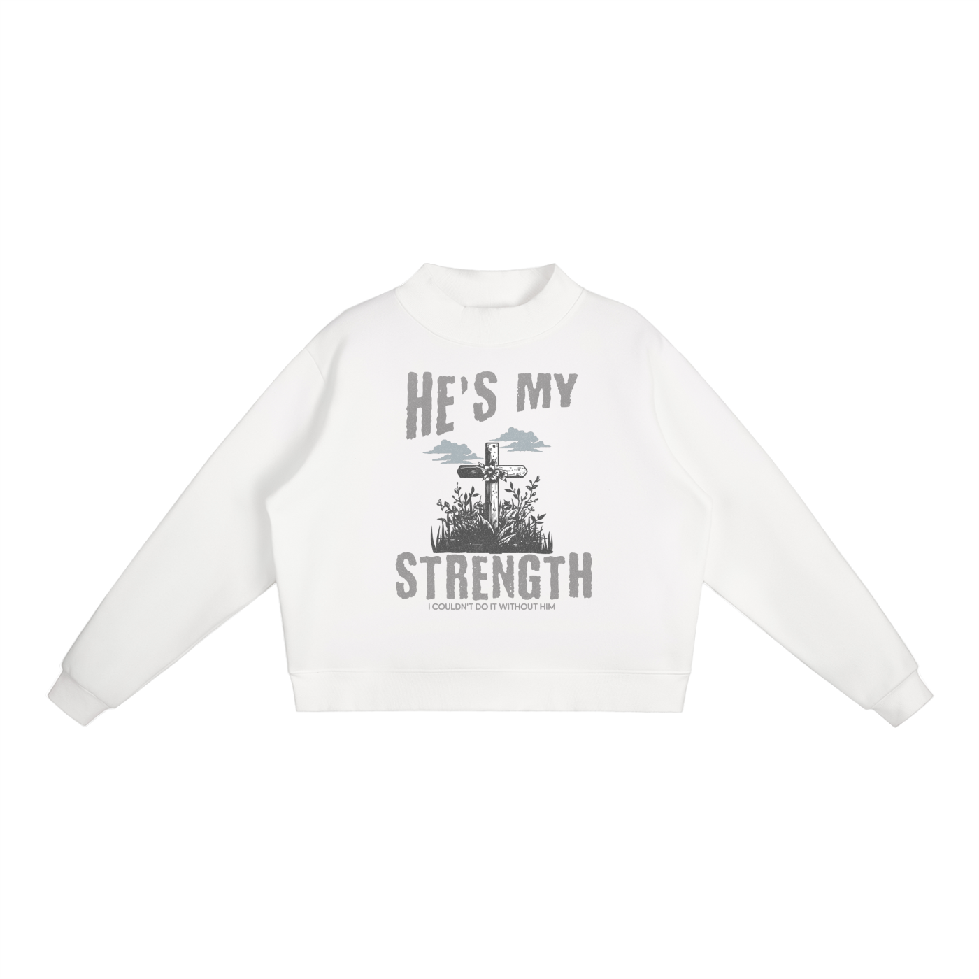 White sweatshirt with graphic design and text on a white background. "He's my strength" text with "I couldn't do it without him" smaller text. Graphic image of cross in a field of grass/flowers with clouds above.