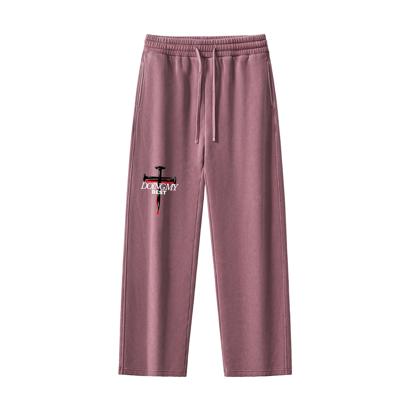 Light red sweatpants with a cross design and 'doing my best' text in front of a white background.