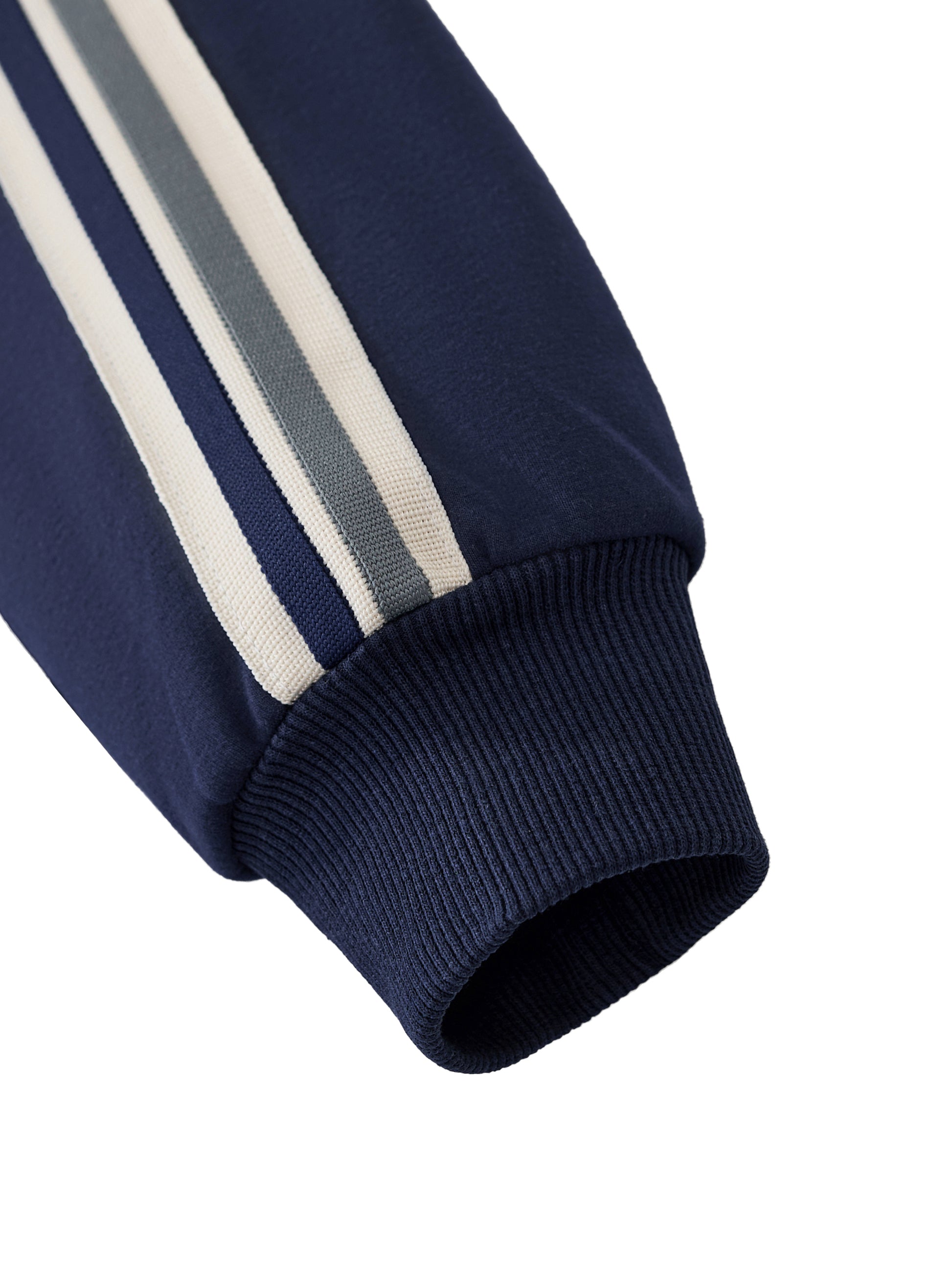 Navy blue sleeve with two white stripes on a white background