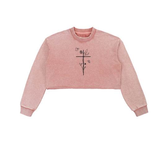 Pink cropped sweatshirt with a black design on a white background